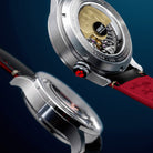 Close-up of AVI-8 Snoopy Automatic watch showing the open back case with a Snoopy rotor