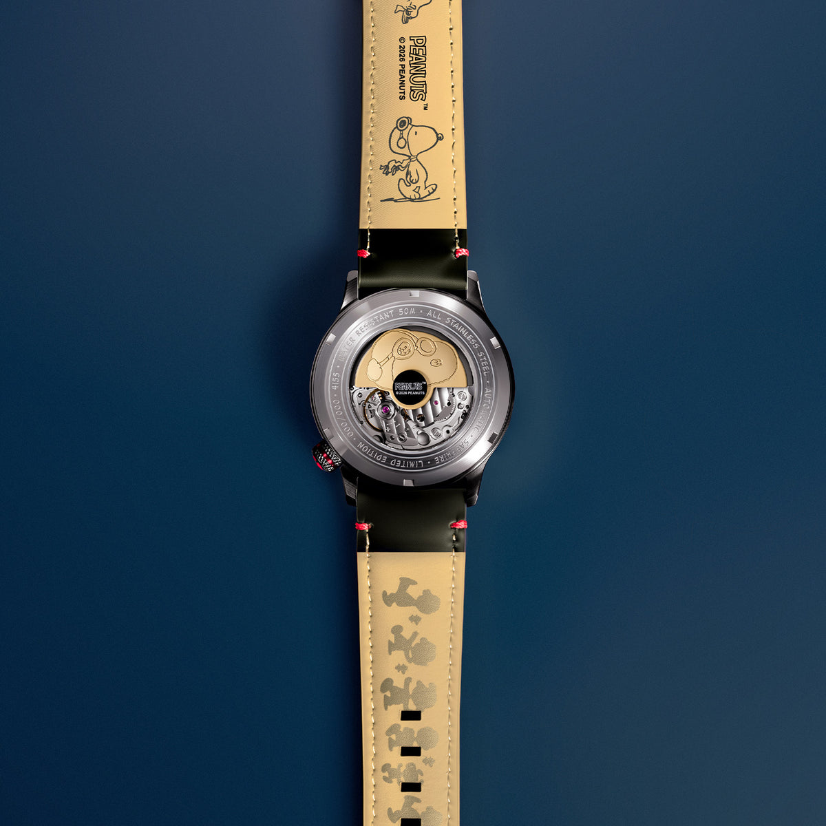AVI-8 Peanuts Snoopy Limited Edition watch, Desert Shadow AV-4155-04, Back view showing open caseback and Snoopy characters on the strap lining