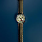AVI-8 Peanuts Snoopy Limited Edition watch, Desert Shadow AV-4155-04, Front view with sand dial and olive green leather strap